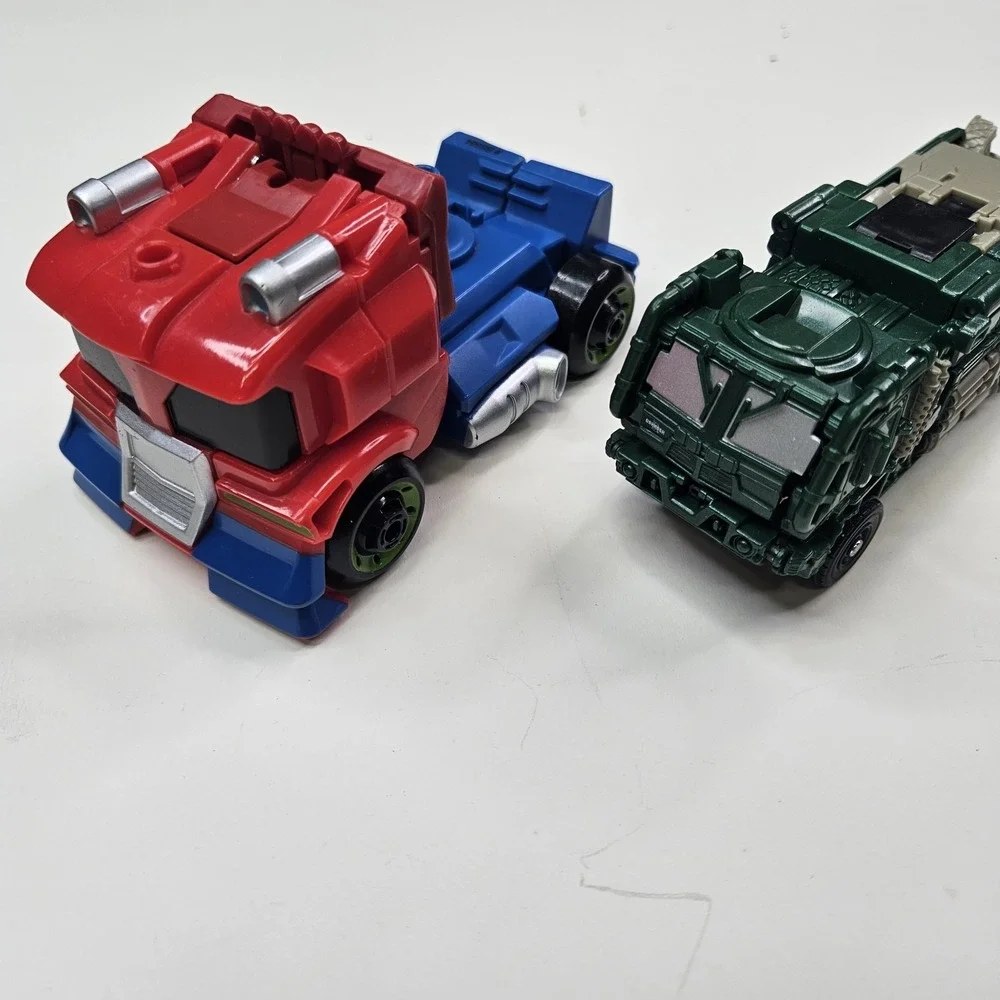 Lot of 5 Transformers Action Figures - Optimus Prime, Bumblebee & More